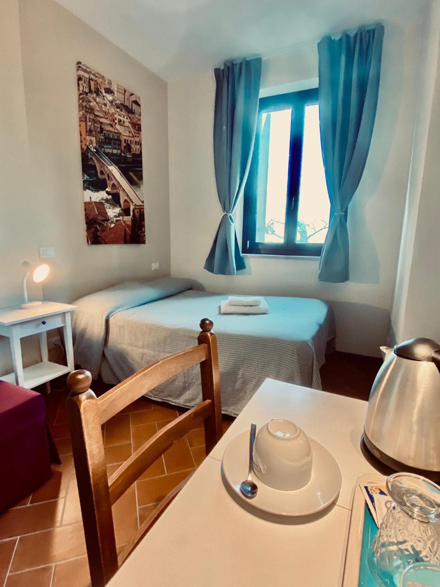 Residenza Cipressi E Olivi Appartement Verona Kamer foto